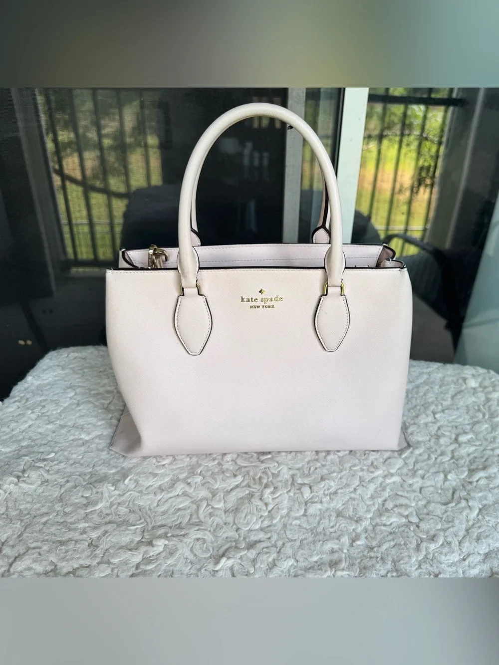 kate spade cream satchel with black trim